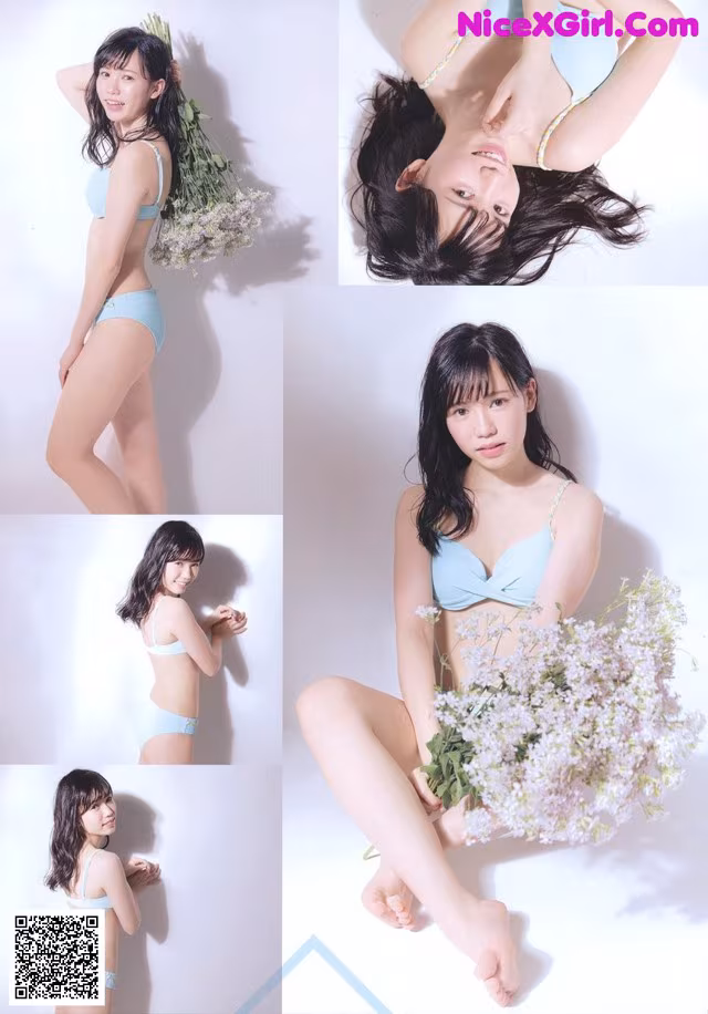 A woman in a blue bikini holding a bunch of flowers.